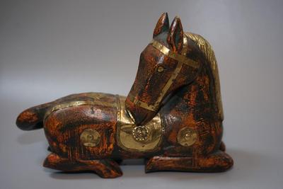 DECORATIVE WOODEN CARVED HORSE WITH APPLIED BRASS EMBELLISHMENTS