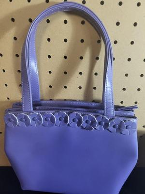 AN ASSORTMENT OF PURSES