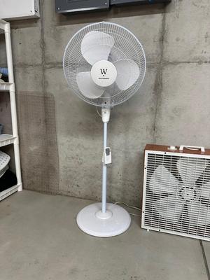 BOX AND OSCILLATING FAN ON AN ADJUSTABLE STAND