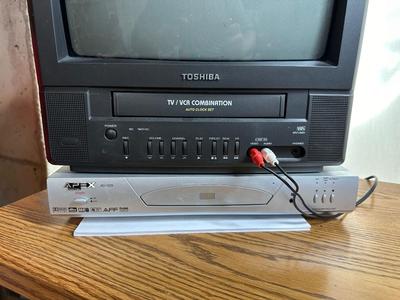 TOSHIBA COMBO TV & VCR PLAYER PLUS APEX DVD PLAYER W/REMOTE