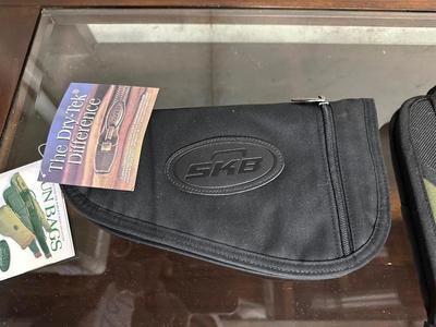CABELAS SNUG FIT CUSTOM MOLDED PISTOL CASE AND SKB DRY-TEK HANDGUN BAG