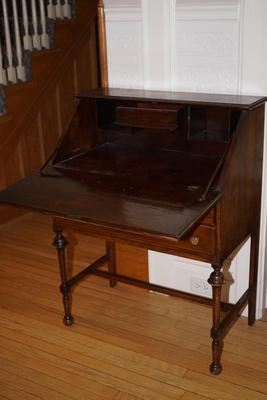 EARLY 1900'S MAHOGANY DROP FRONT WRITING DESK W/ TWO DRAWERS/ TRUMPET TURNED LEGS