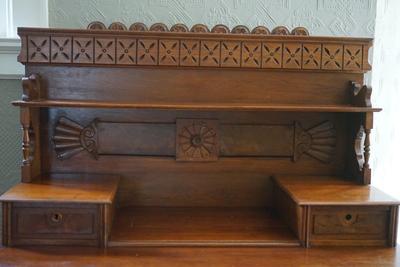 EXCEPTIONAL LATE 19TH CENTURY WALNUT BUREAU W/ SUNBURST STYLE CARVING AND GALLERY TOP
