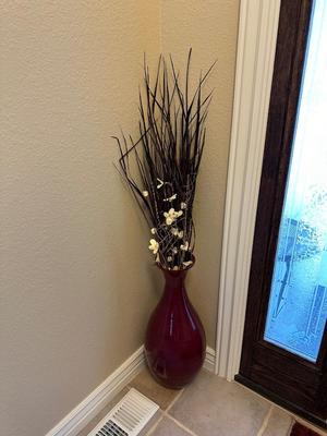 FLOOR VASE W/DRIED FOLIAGE AND AN ACCENT RUG