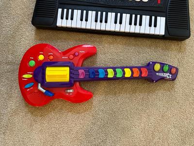 TOY GUITAR AND KEYBOARD
