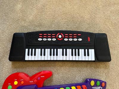 TOY GUITAR AND KEYBOARD
