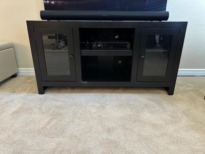 BLACK MEDIA STAND W/2 GLASS FRONT CABINETS