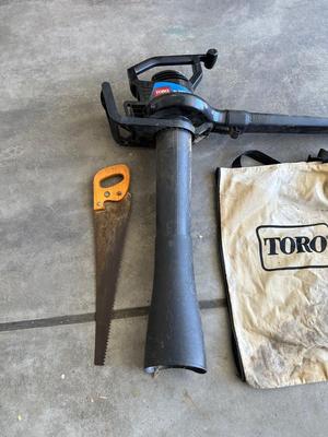 TORO LEAF BLOWER AND VACUUM PLUS A HAND SAW