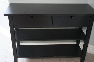 TWO DRAWER WOODEN SHELF TWO SHELVES AND TWO DRAWERS ON TOP. PAINTED BLACK