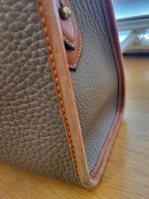 A GENUINE DOONEY BOURKE PURSE