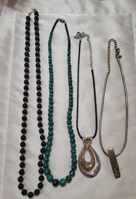 4 COSTUME NECKLACES