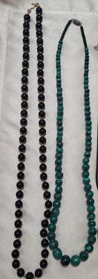 4 COSTUME NECKLACES