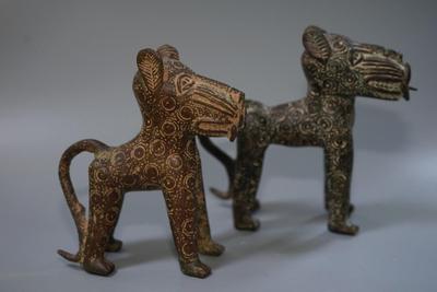 BRONZE STANDING DOGS /EMBOSSED CIRCLES/ FRONT TEETH PAWS AND TAILS. UNIQUE SCULPTURES