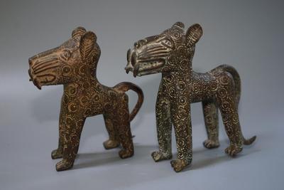 BRONZE STANDING DOGS /EMBOSSED CIRCLES/ FRONT TEETH PAWS AND TAILS. UNIQUE SCULPTURES
