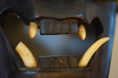 CHINESE RITUAL MASKS OF CARVED WOOD BLACK EBONY FINISH TEETH