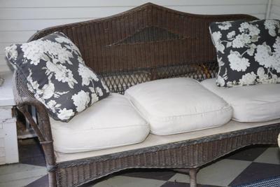 1920'S WICKER SOFA OF DECO DESIGN. WITH SUNBRELLA CUSHIONS OF QUALITY.