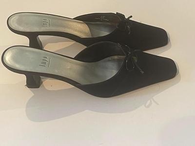 Brand New black mules by Impo in size 6.5