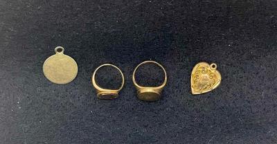 Jewelry Lot: (2) 10k Gold Fill Rings, (1) 12k Gold Charm, (1) Gold-tone Heart Charm