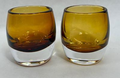 2 Amber candleholders with clear bottom