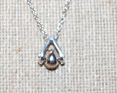 "V" Shaped Surround with a Pear Cut Deep Blue Stone PENDANT (½" x ½") on a Silver Tone Necklace Chain 17" L