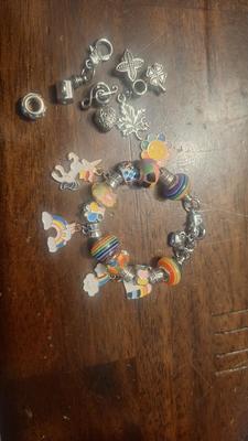 Girls charm bracelet with extra charms