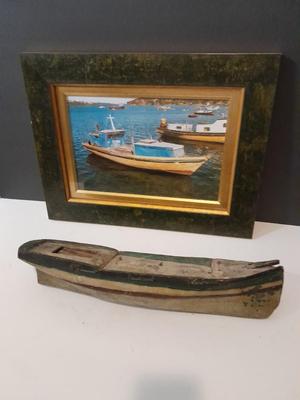 Antique carved Shipwrecked boat and fisherman figure with framed boat artwork
