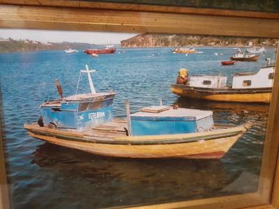 Antique carved Shipwrecked boat and fisherman figure with framed boat artwork