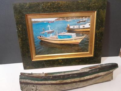 Antique carved Shipwrecked boat and fisherman figure with framed boat artwork
