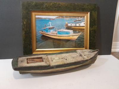 Antique carved Shipwrecked boat and fisherman figure with framed boat artwork
