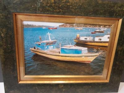 Antique carved Shipwrecked boat and fisherman figure with framed boat artwork