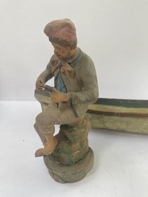 Antique carved Shipwrecked boat and fisherman figure with framed boat artwork