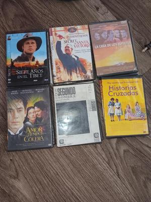 Samsung Dvd player and remote with a variety of dvd movies in different languages