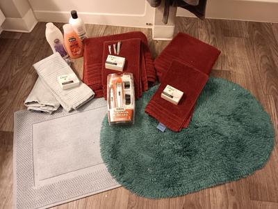 Bathing & Showering needs Bath rugs - Towels - Bath robe and an assortment of soap and shampoo's