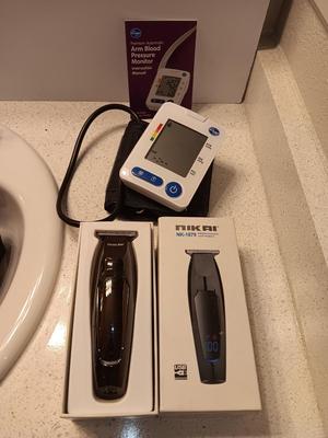 Blood Pressure Monitor with cuff and case and Nikai NK-1879 Professional hair trimmers