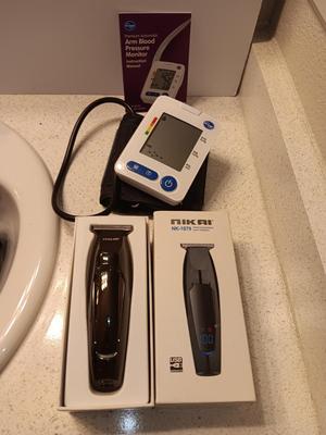 Blood Pressure Monitor with cuff and case and Nikai NK-1879 Professional hair trimmers