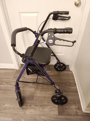 Like new - DRIVE 300lb limit rollator Mobility walker with seat and storage