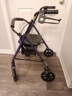 Like new - DRIVE 300lb limit rollator Mobility walker with seat and storage