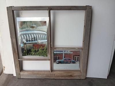 Antique wooden window frame with photographs of a Buick Eight car