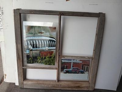 Antique wooden window frame with photographs of a Buick Eight car