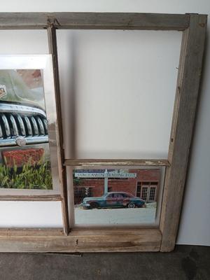 Antique wooden window frame with photographs of a Buick Eight car