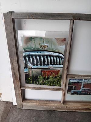 Antique wooden window frame with photographs of a Buick Eight car