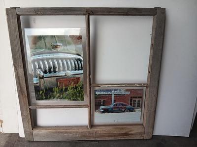 Antique wooden window frame with photographs of a Buick Eight car