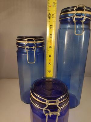 Three Blue Glass Bale Top Canisters