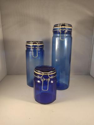 Three Blue Glass Bale Top Canisters