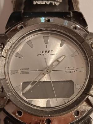 Sports watch = 165 FT. Water resistant wristwatch with Velcro band