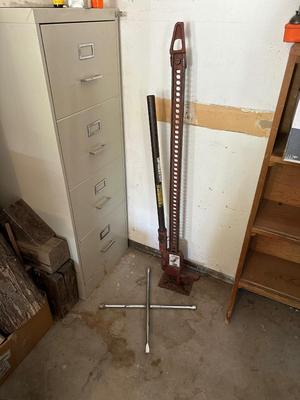 HI-LIFT JACK AND A 4 WAY LUG NUT WRENCH
