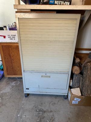 WRIGHT LINE CABINET W/ACCORDIAN DOOR AND DRAWER ON CASTERS