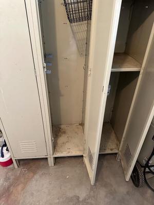 A SECTION OF 3 SCHOOL LOCKERS SLIGHTLY MODIFIED