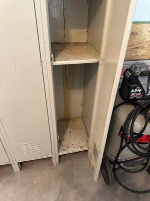 A SECTION OF 3 SCHOOL LOCKERS SLIGHTLY MODIFIED