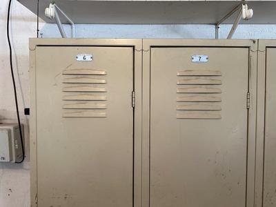 A SECTION OF 3 SCHOOL LOCKERS SLIGHTLY MODIFIED